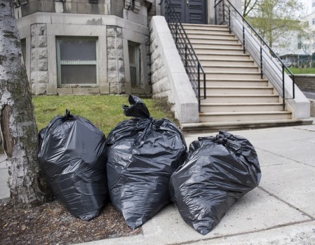 Workers sorting recyclables during waste clearance